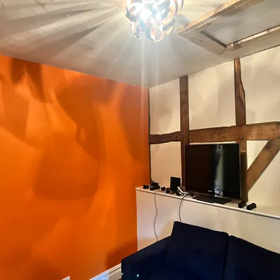blue room pink sofa